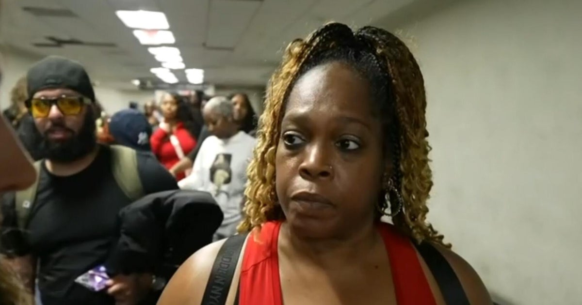 Worried travelers arrive extra early to wait in huge security lines