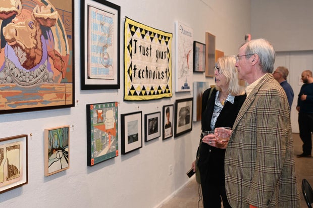 People pose for photos at Inliquid Art Bash 2026 