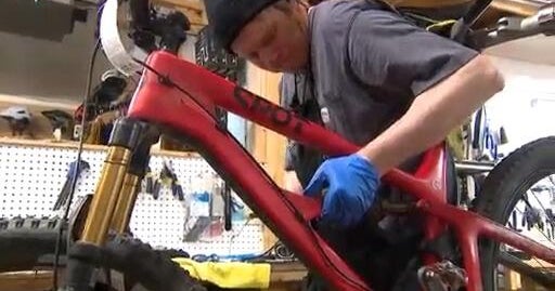 Businesses in the mountains trading ski rentals for bike rentals during warm spring
