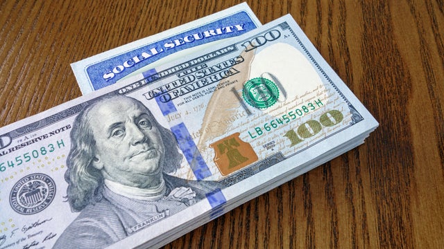 Dollar bills and Social Security Card 