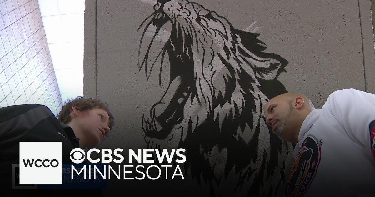 Former Shakopee East student returns as custodian, paints murals throughout school