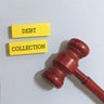 Debt collection concept with gavel, pen, and notes 