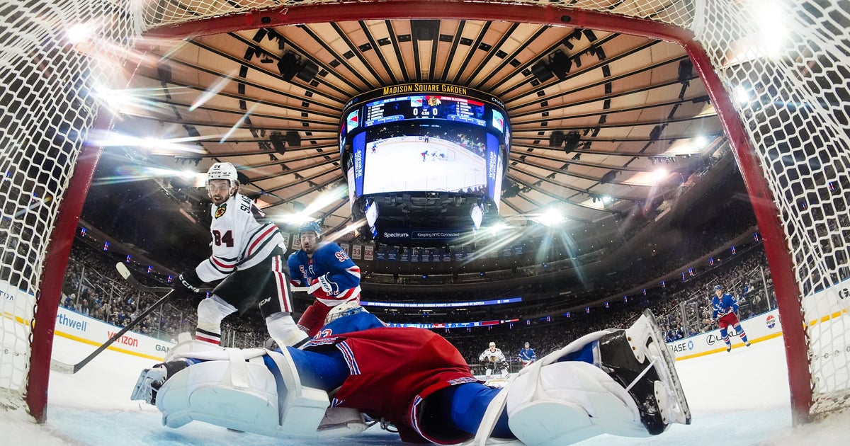 Garand stops 27 for first NHL win as Rangers down Blackhawks 6-1 - CBS ...