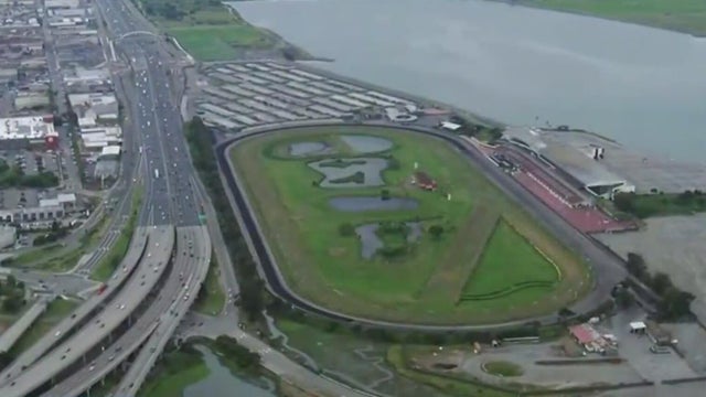 an aerial view of a now-closed horse racetrack stadium 