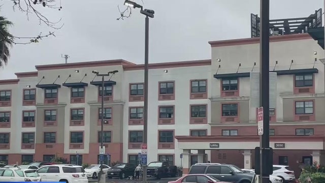 A repurposed hotel building used as a transitional housing site for homeless residents 