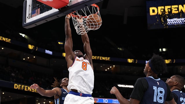 Og Anunoby #8 of the New York Knicks goes to the basket against Javon Small #10 of the Memphis Grizzlies during the first half at FedExForum on April 01, 2026 in Memphis, Tennessee. 