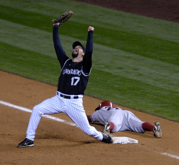 10.15.2007 -- Colorado Rockies first baseman Todd Helton celebrates the third out in the Rockies 6-4 win in game 4 the National League Championship series between the Colorado Rockies and Arizona Diamondbacks Monday, Oct. 15, 2007 at Coors Field in Denver
