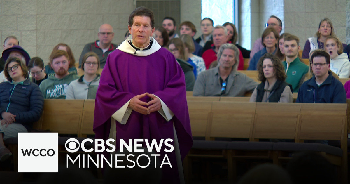 How a legally blind Minnesota priest maintains an active fitness routine
