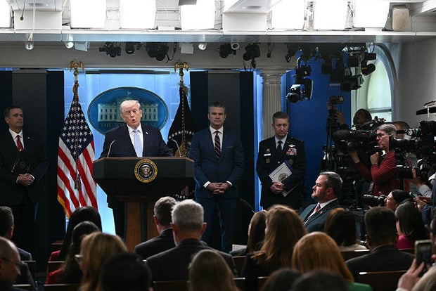 President Trump speaks about the conflict in Iran alongside CIA Director John Ratcliffe, Defense Secretary Pete Hegseth and Gen. Dan Caine in the James S. Brady Press Briefing Room of the White House in Washington, D.C., on Monday, April 6, 2026. 