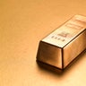 Gold ingot with gold copy space 