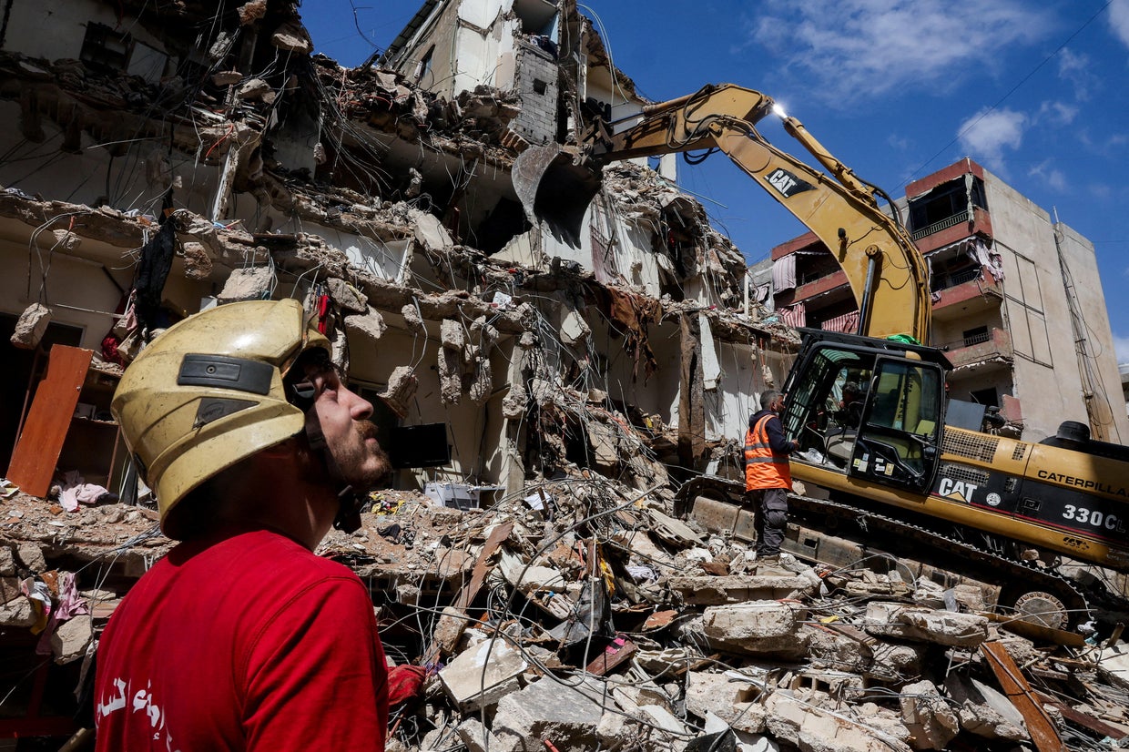 Rescuers using heavy equipment work at the site of an Israeli strike two days earlier in the southern suburbs of Beirut, Lebanon, April 10, 2026.