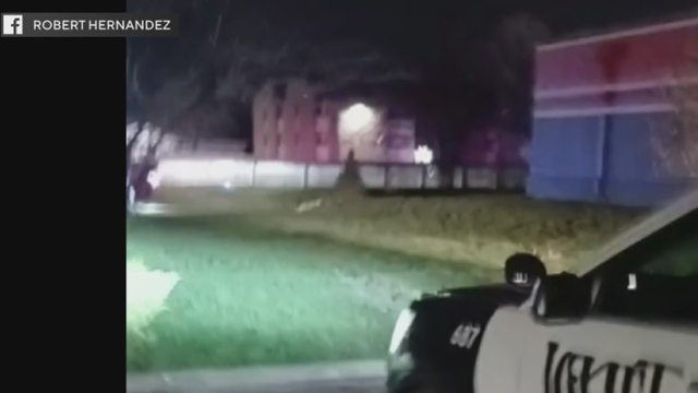 Generic police lights and yellow police tape at crime scene 