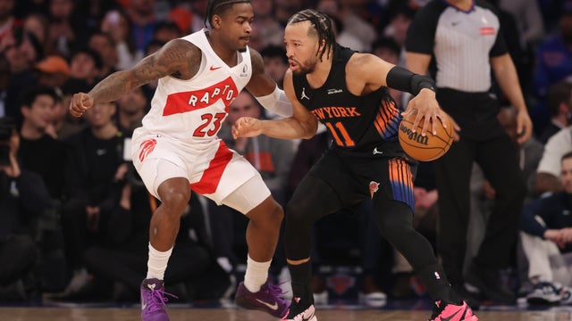 Jalen Brunson #11 of the New York Knicks dribbles the ball against Jamal Shead #23 of the Toronto Raptors during the first quarter at Madison Square Garden on April 10, 2026 in New York City. 