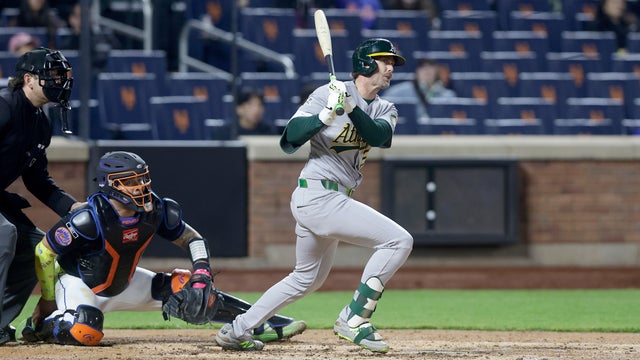 Jeff McNeil #22 of the Athletics follows through on his double in the fourth inning against the New York Mets at Citi Field on April 10, 2026 in New York City. 