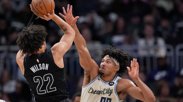 Jalen Wilson #22 of the Brooklyn Nets shoots the ball against Jericho Sims #00 of the Milwaukee Bucks during the second quarter at Fiserv Forum on April 10, 2026 in Milwaukee, Wisconsin. 