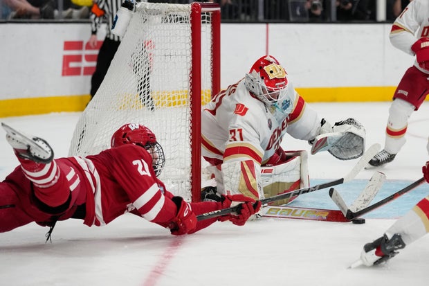 APTOPIX NCAA Denver Wisconsin Hockey 