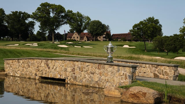 The Wanamaker Trophy sits on a stone wall near the 17th hole at Aronimink Golf Club 