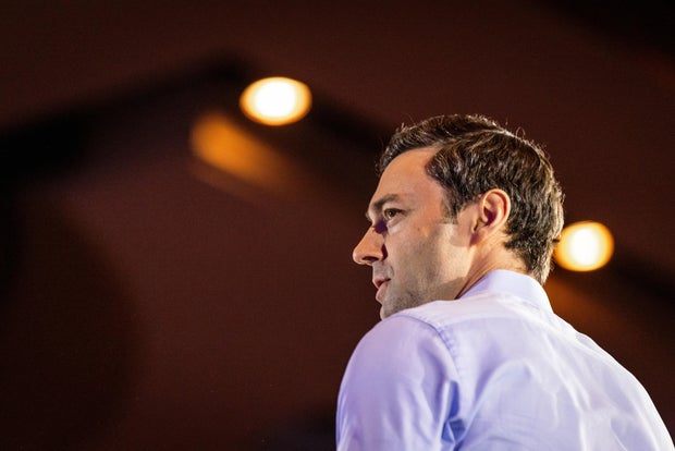 Sen. Jon Ossoff arrives on stage during a re-election campaign event in Atlanta, Georgia, on Feb. 7, 2026.