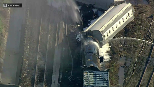 Derailed freight train cars 