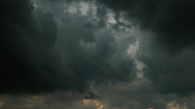An ominous, black, cloudy sky 