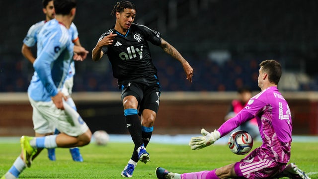 Idan Toklomati #9 of Charlotte FC scores a goal against Matthew Freese #49 of New York City FC during the second half at Citi Field on April 18, 2026 in New York, New York. 