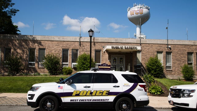 A West Chester University police car is seen in front of the public safety building 