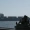 U.S. shoots at Iranian ship and seizes it as Strait of Hormuz tensions run high