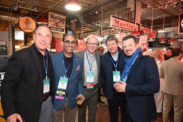 People post for photos at the WTC Greater Philadelphia Global Forum 