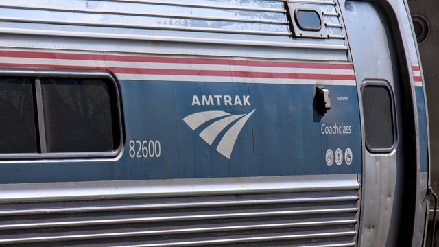 Amtrak train detail on railroad tracks in Stamford, Connecticut. 