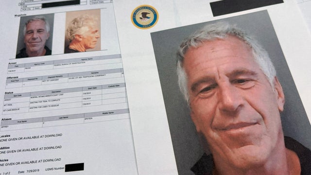 Documents that were included in the Department of Justice release of the Jeffrey Epstein files are photographed Friday, Jan. 2, 2026. 
