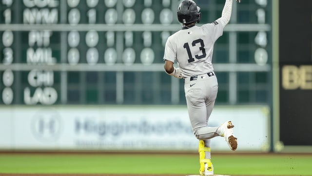 Jazz Chisholm Jr. #13 of the New York Yankees reacts after hitting a home run in the fourth inning against the Houston Astros at Daikin Park on April 24, 2026 in Houston, Texas. 