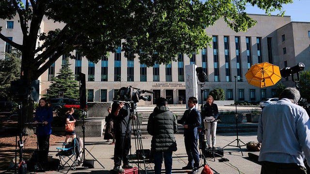 Media set up outside the E. Barrett Prettyman United States Courthouse in Washington, D.C., on Monday, April 27, 2026. 