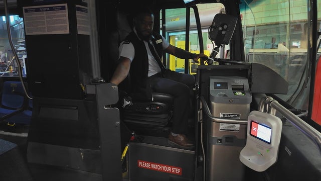 A SEPTA bus driver sits in the driver's seat 