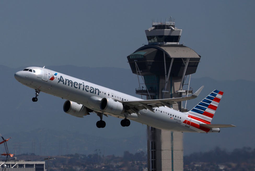 Pilot reports possible burn injuries after passenger's laptop catches fire