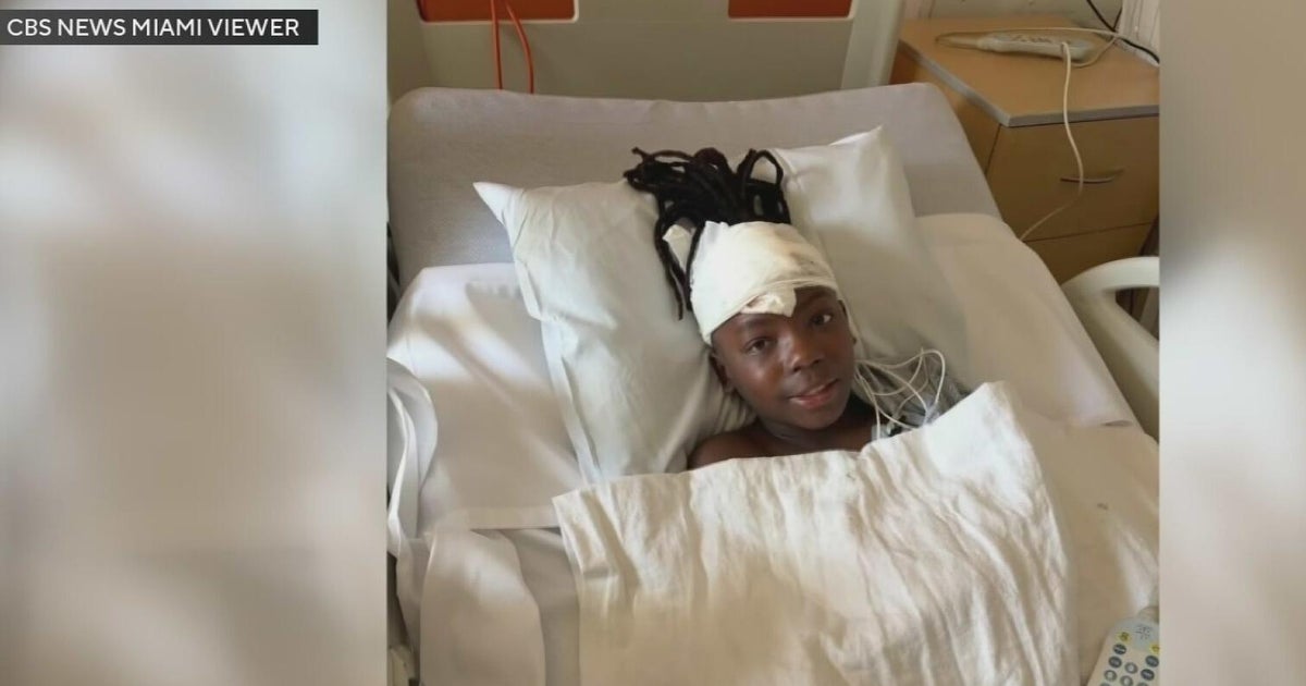 11-year-old boy seen smiling in the hospital as he recovers from being hit by a car