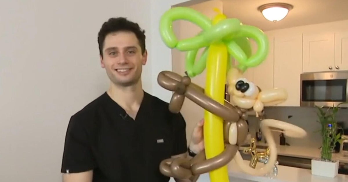 Doctor uses balloon art side hustle to pay student loans