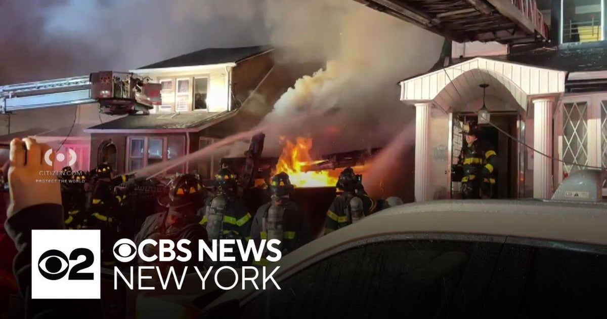 Man's body found after explosion, fire at Queens home - CBS New York