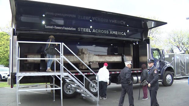 Steel beam recovered from wreckage of Ground Zero displayed in truck 