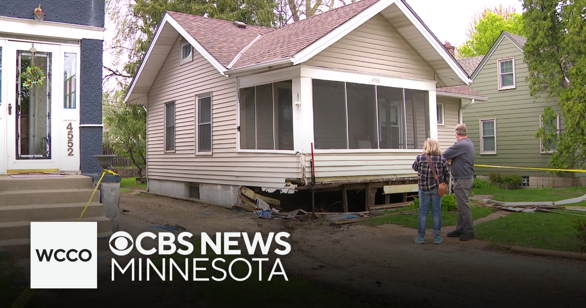 Minneapolis home damaged when stolen car T-bones state trooper