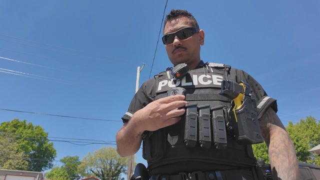 An East Lansdowne officer holds the body camera, which also works as a translator 