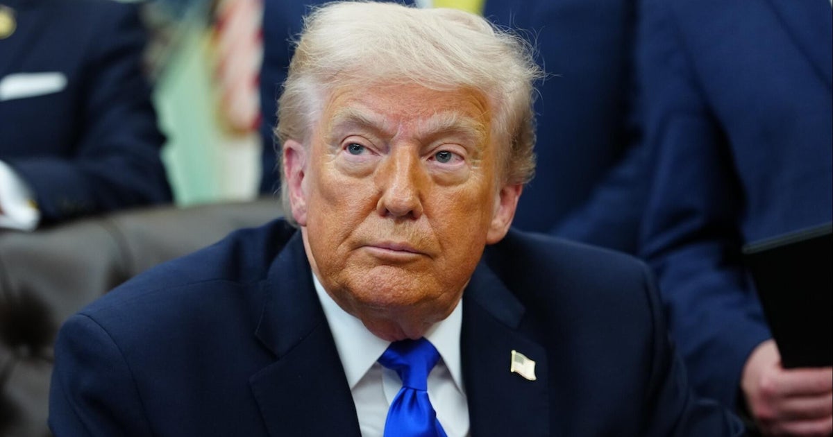 White House gives mixed messages on Iran war as Trump says Strait of Hormuz operation is paused
