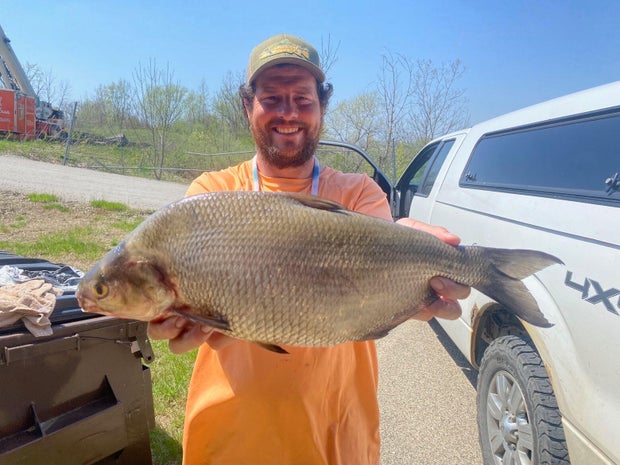 angler-with-fish.jpg 