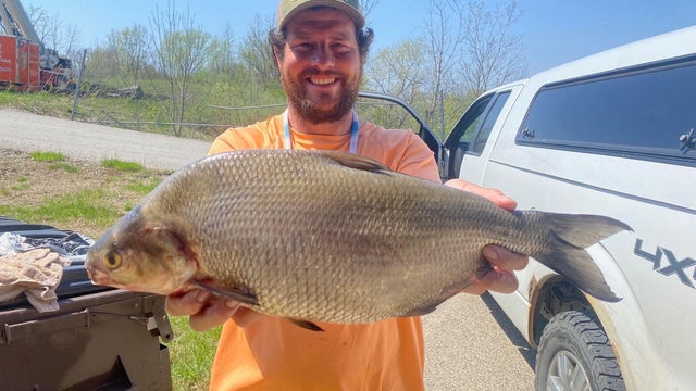 angler-with-fish.jpg 