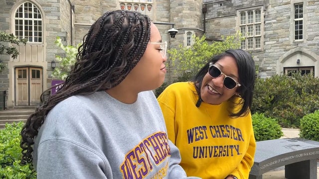 Jasmine Worrell and Zayla Dutton chat together on campus at West Chester University 