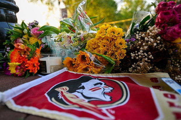 Students hold a vigil near the scene of a shooting near the Florida State University student center April 17, 2025, in Tallahassee, Florida. 