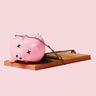 Piggy Bank with X Eyes Trapped in Mousetrap Symbolizing Financial Loss and Economic Risk 