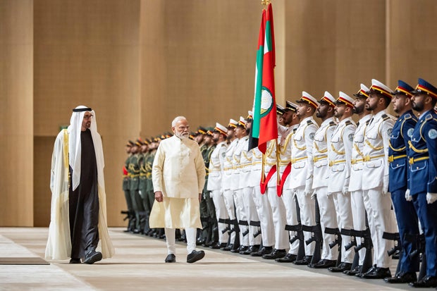 President of the United Arab Emirates Mohamed bin Zayed Al Nahyan and Indian Prime Minister Narendra Modi inspect the UAE Armed Forces honor guard in Abu Dhabi, May 15, 2026. 