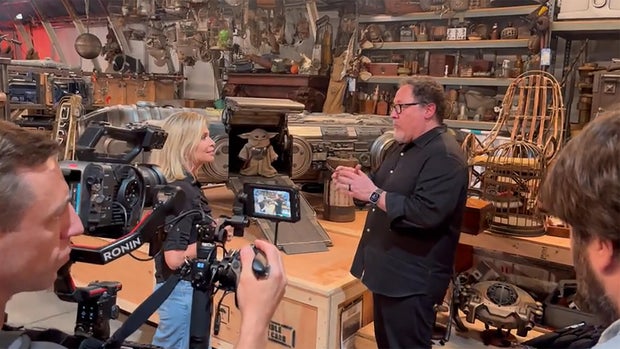 jon-favreau-with-grogu-puppet.jpg