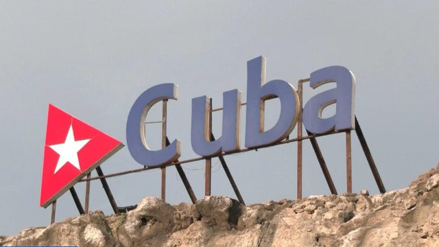 US and Cuban flags side by side in Havana, Cuba 