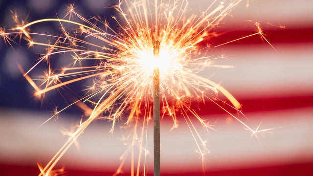 Sparkler and American flag 